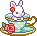 white bunny on a teal teacup set